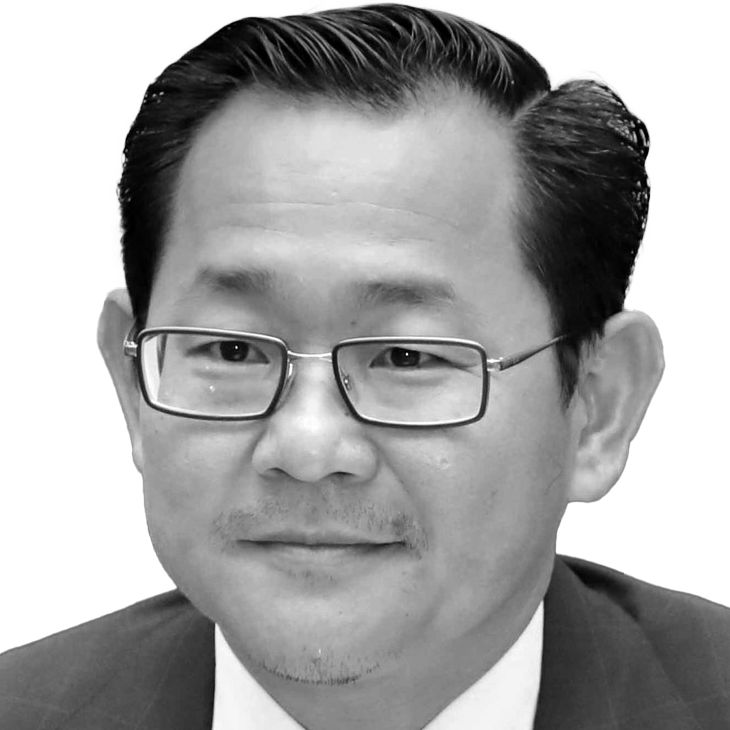 Black and white portrait of Koeut Rith