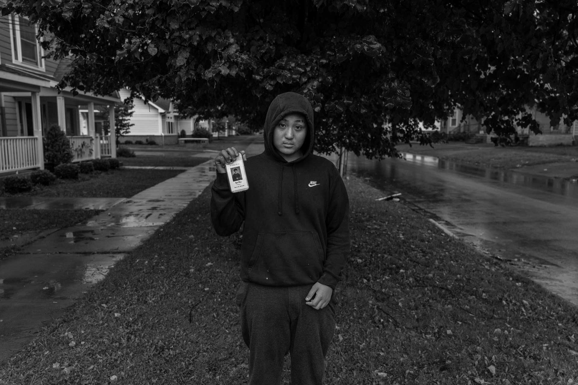 Met Ka Pur Soe, cousin and close friend of Nyah Mway, displays his phone with a picture of Nyah in Utica, New York, Aug. 18, 2024. 'Nyah was very funny and loved rap music,' said Met Ka Pur Soe, who used to tease Nyah over his fondness for dressing in hoodies and imitating the rapper Kodak Black.