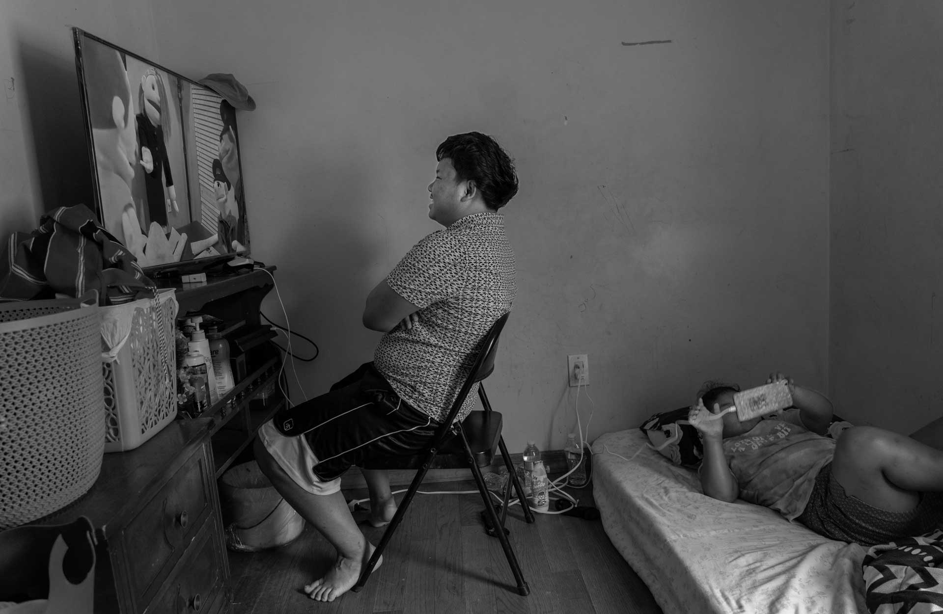 Thoung Oo, Nyah Mway’s eldest brother visits a stream in Utica, New York, Aug. 19, 2024. The brothers used to go on bicycle rides, play basketball in a nearby court and take a dip in the stream, especially during hot summer days. 