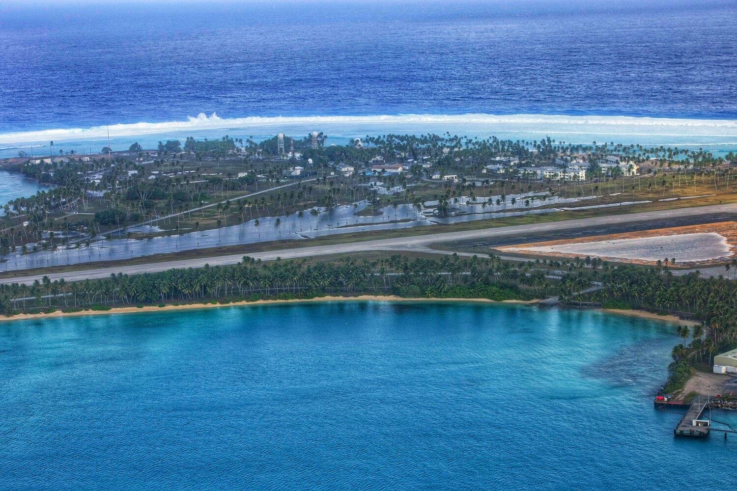 Aerial view of a surge of unexpected waves swamping the island of Roi-Namur in the Marshall Islands, pictured Jan. 21, 2024. (Jessica Dambruc /U.S. Army Garrison-Kwajalein Atoll/AFP)